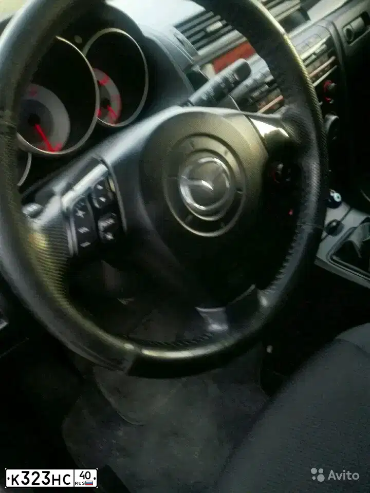 Фото автомобиля MAZDA 3, 2008 — госномер К323НС40. Цвет: Красный