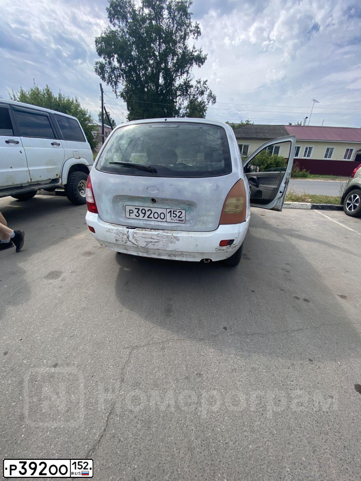 Фото автомобиля LADA 1117 KALINA, 2010 — госномер Р392ОО152. Цвет: Белый