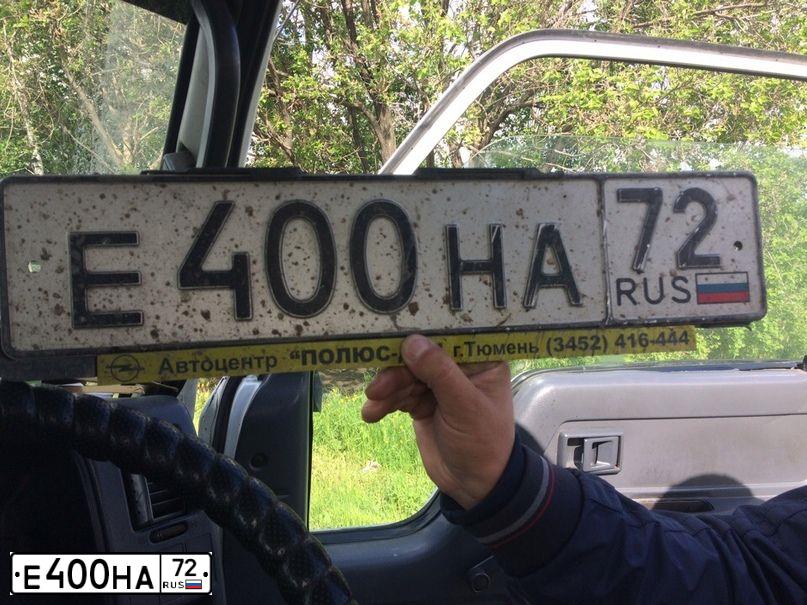 Фото автомобиля OPEL CORSA, 2006 — госномер Е400НА72. Цвет: Красный