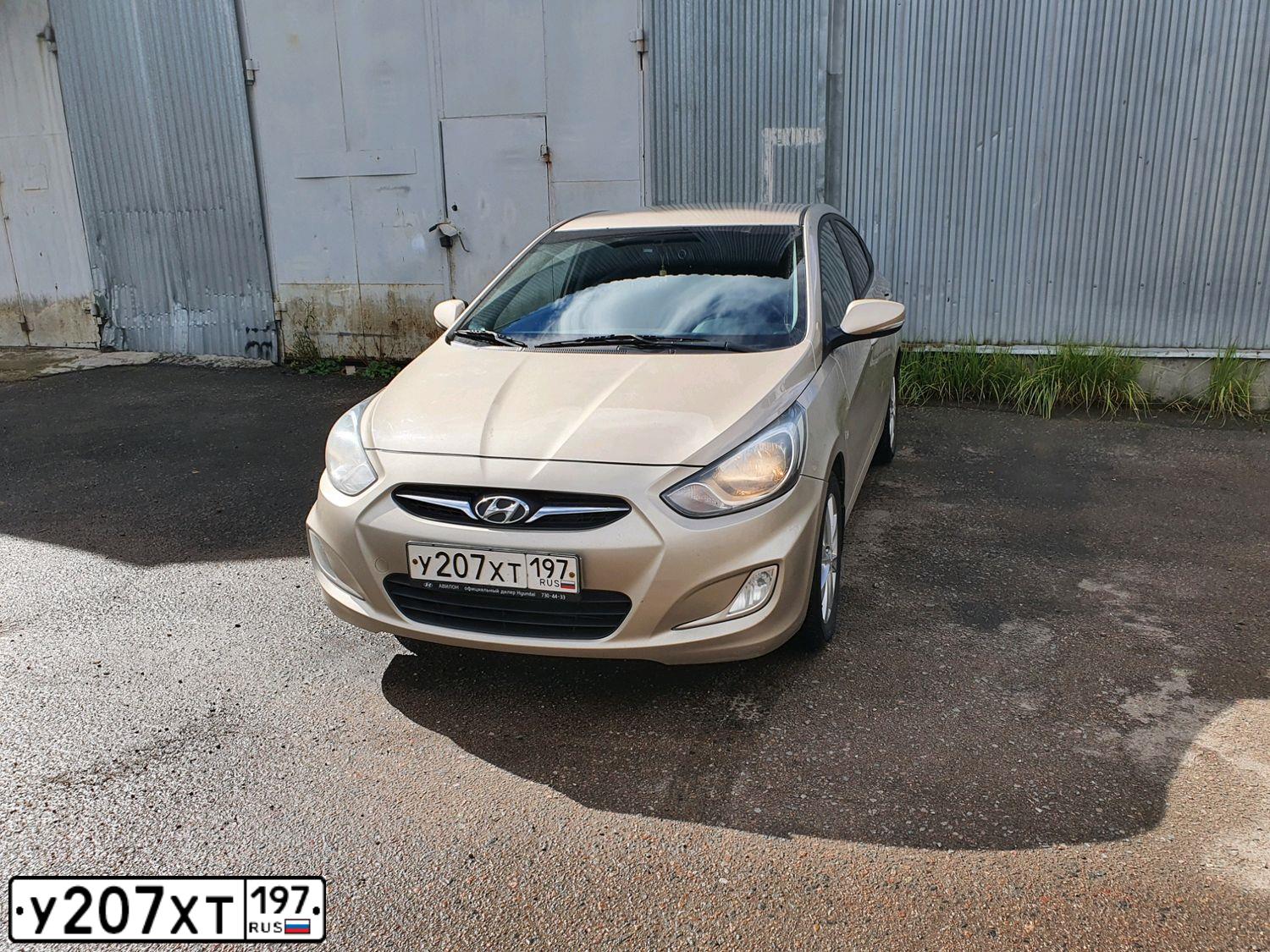 Фото автомобиля HYUNDAI SOLARIS, 2012 — госномер Р211ВА184. Цвет: БЕЖЕВО-СЕРЫЙ