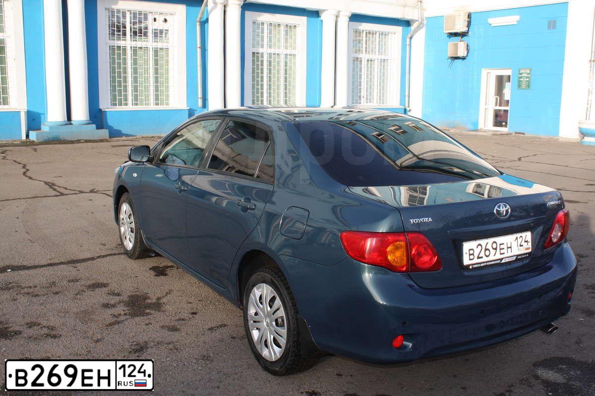 Фото автомобиля TOYOTA COROLLA, 2007 — госномер В269ЕН124. Цвет: ТЕМНО-СИНИЙ
