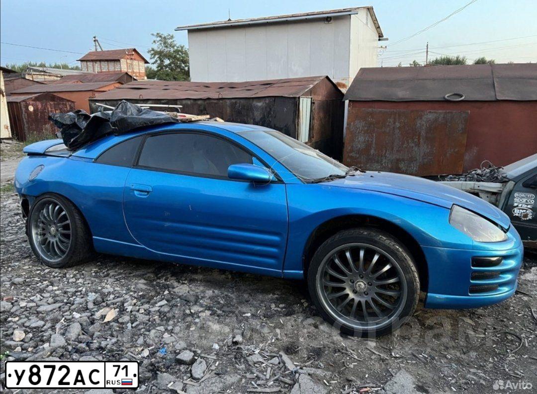 Фото автомобиля MITSUBISHI ECLIPSE, 2001 — госномер Т775НЕ750. Цвет: синий