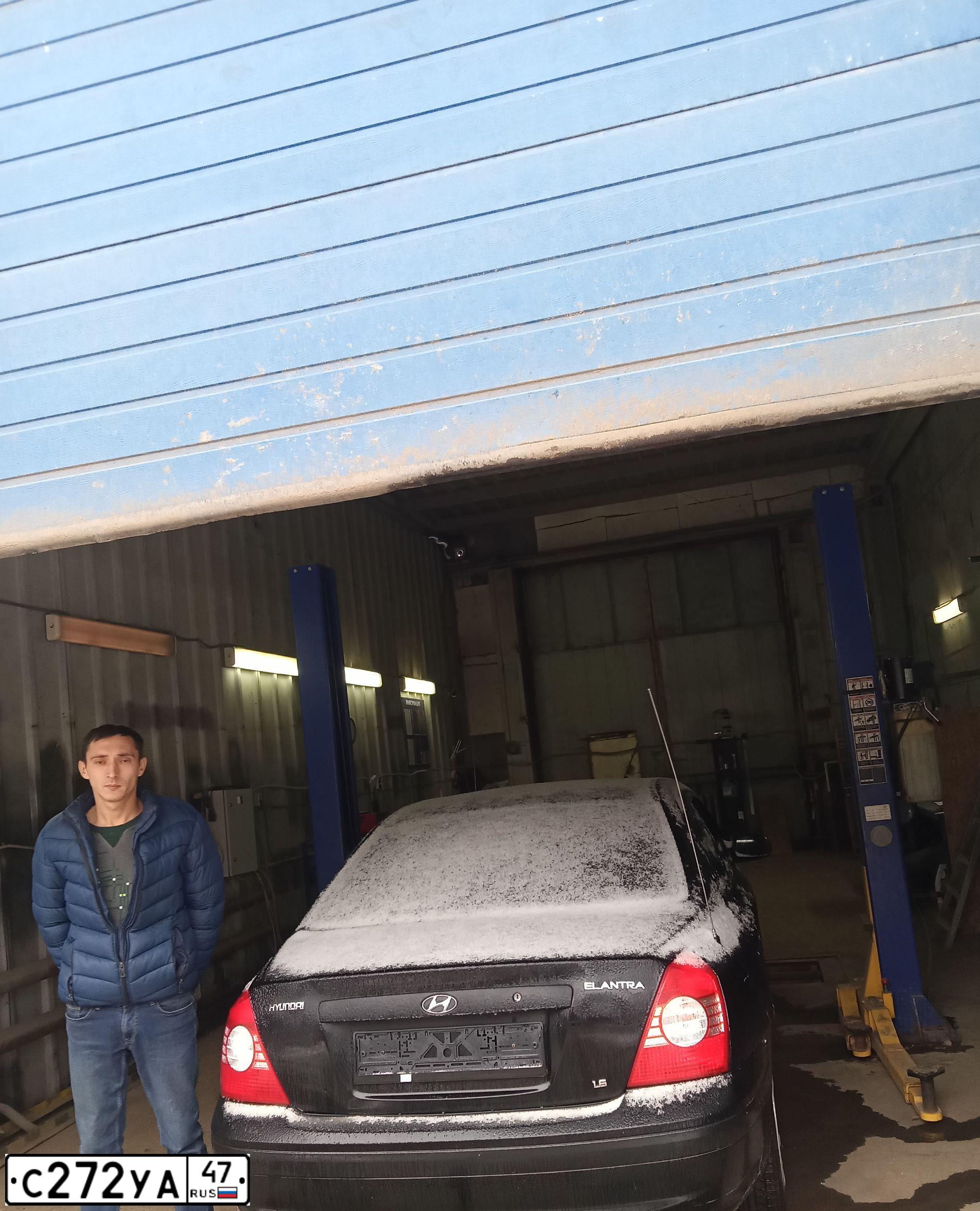 Фото автомобиля HYUNDAI ELANTRA, 2004 — госномер К586РМ702. Цвет: ЧЕРНЫЙ