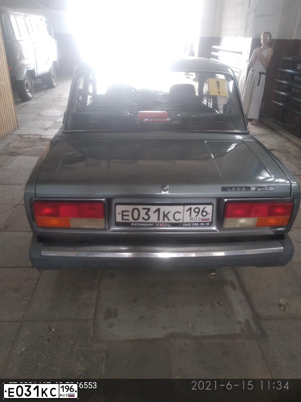 Фото автомобиля LADA 2107, 2011 — госномер Е031КС196. Цвет: СЕРО-ЗЕЛЕНЫЙ