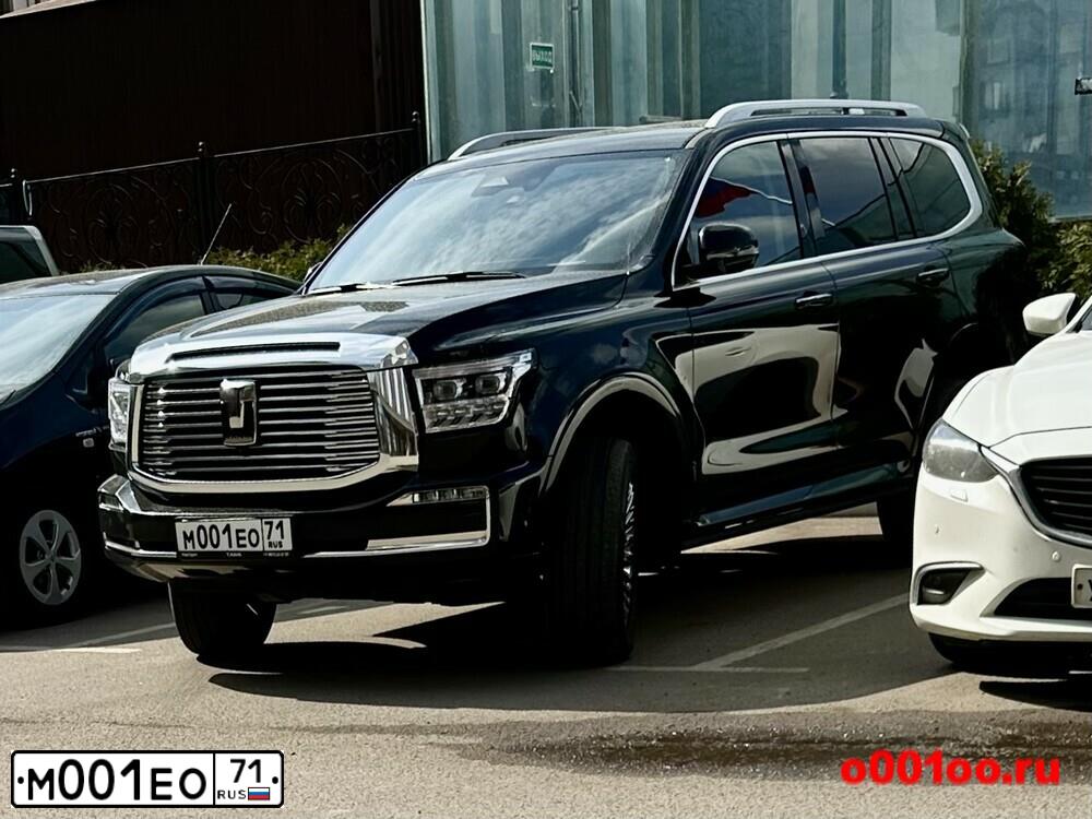 Фото автомобиля VOLKSWAGEN TOUAREG, 2011 — госномер М001ЕО71. Цвет: ЧЕРНЫЙ
