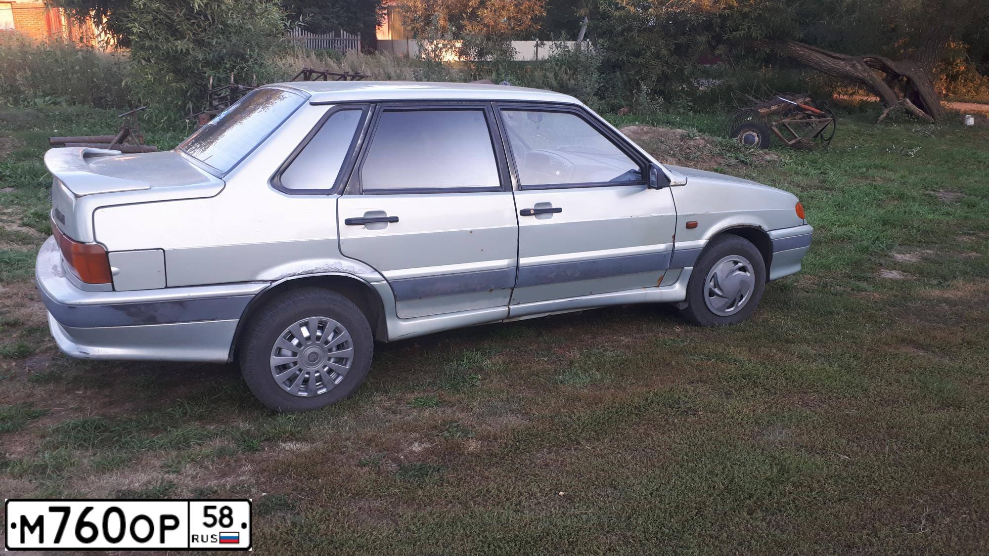 Фото автомобиля LADA 2115 SAMARA, 2003 — госномер М002КР13. Цвет: СЕРЕБРИСТ ЖЕЛТО-ЗЕЛЕНЫЙ