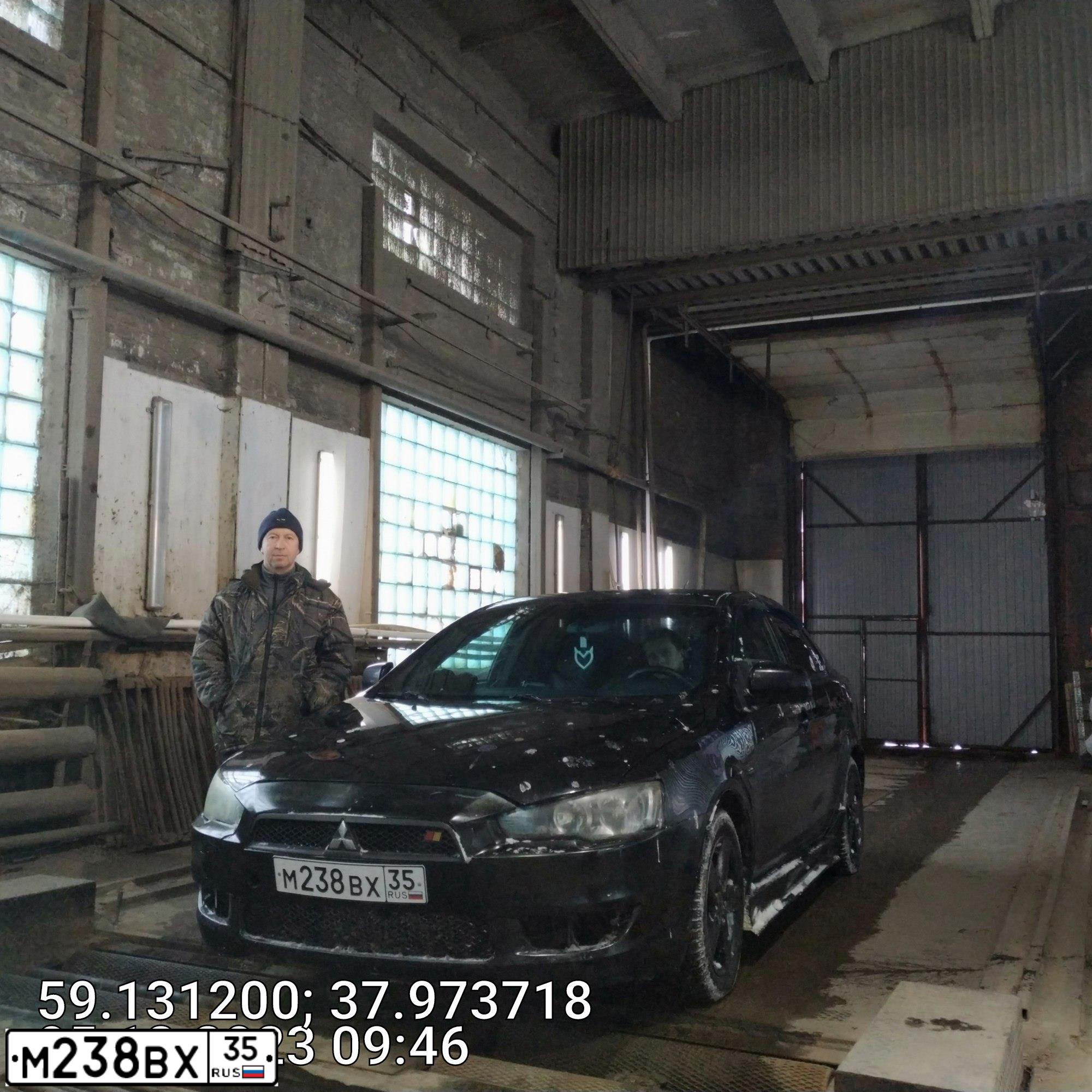 Фото автомобиля MITSUBISHI LANCER, 2008 — госномер К050КР35. Цвет: ЧЕРНЫЙ