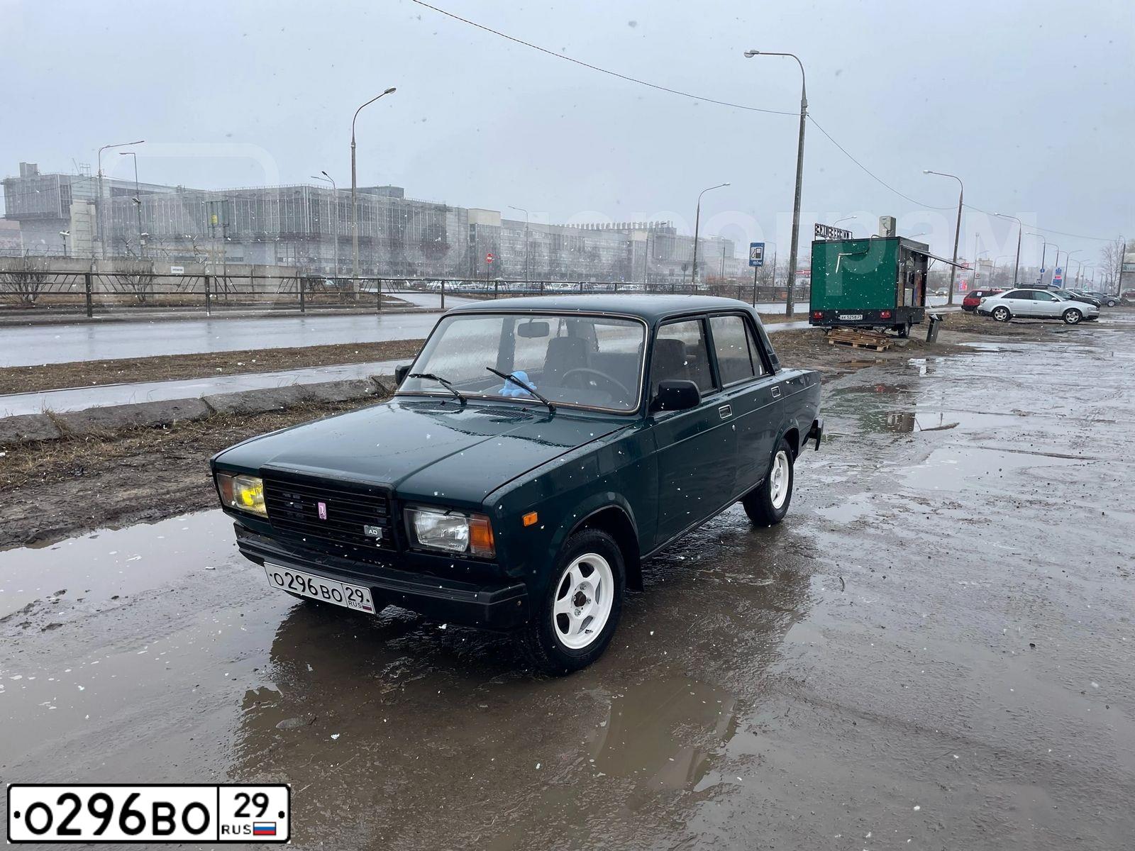 Фото автомобиля LADA 2107, 2005 — госномер О296ВО29. Цвет: Темно-зеленый