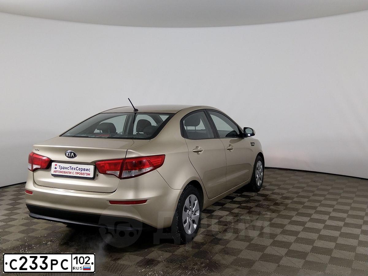 Фото автомобиля KIA RIO, 2015 — госномер Е760ХЕ702. Цвет: БЕЖЕВЫЙ