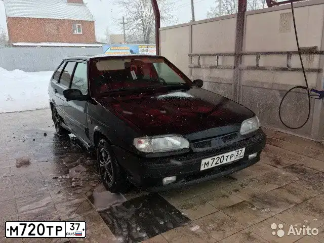 Фото автомобиля LADA 2114 SAMARA, 2006 — госномер Е114ТО161. Цвет: ЧЕРНЫЙ