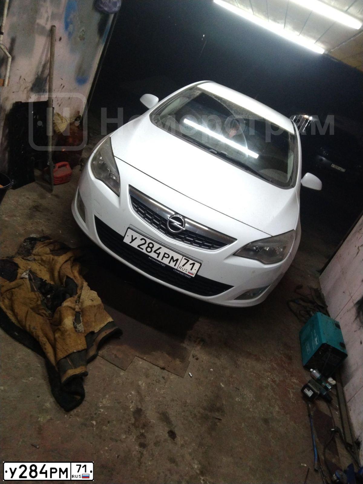 Фото автомобиля OPEL ASTRA, 2010 — госномер У284РМ71. Цвет: БЕЛЫЙ