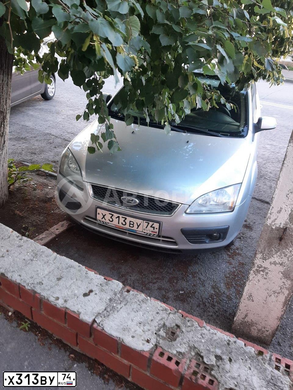 Фото автомобиля FORD FOCUS, 2007 — госномер Х313ВУ74. Цвет: СЕРЕБРИСТЫЙ