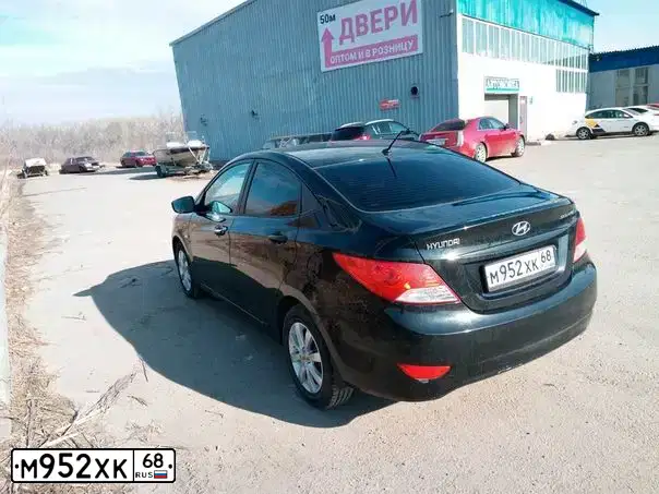 Фото автомобиля HYUNDAI SOLARIS, 2011 — госномер М952ХК68. Цвет: ЧЕРНЫЙ