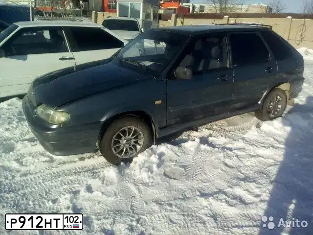 Фото автомобиля ВАЗ 21144, 2010 — госномер В080МК702. Цвет: СРЕДНИЙ СЕРО-ЗЕЛЕНЫЙ МЕТ.