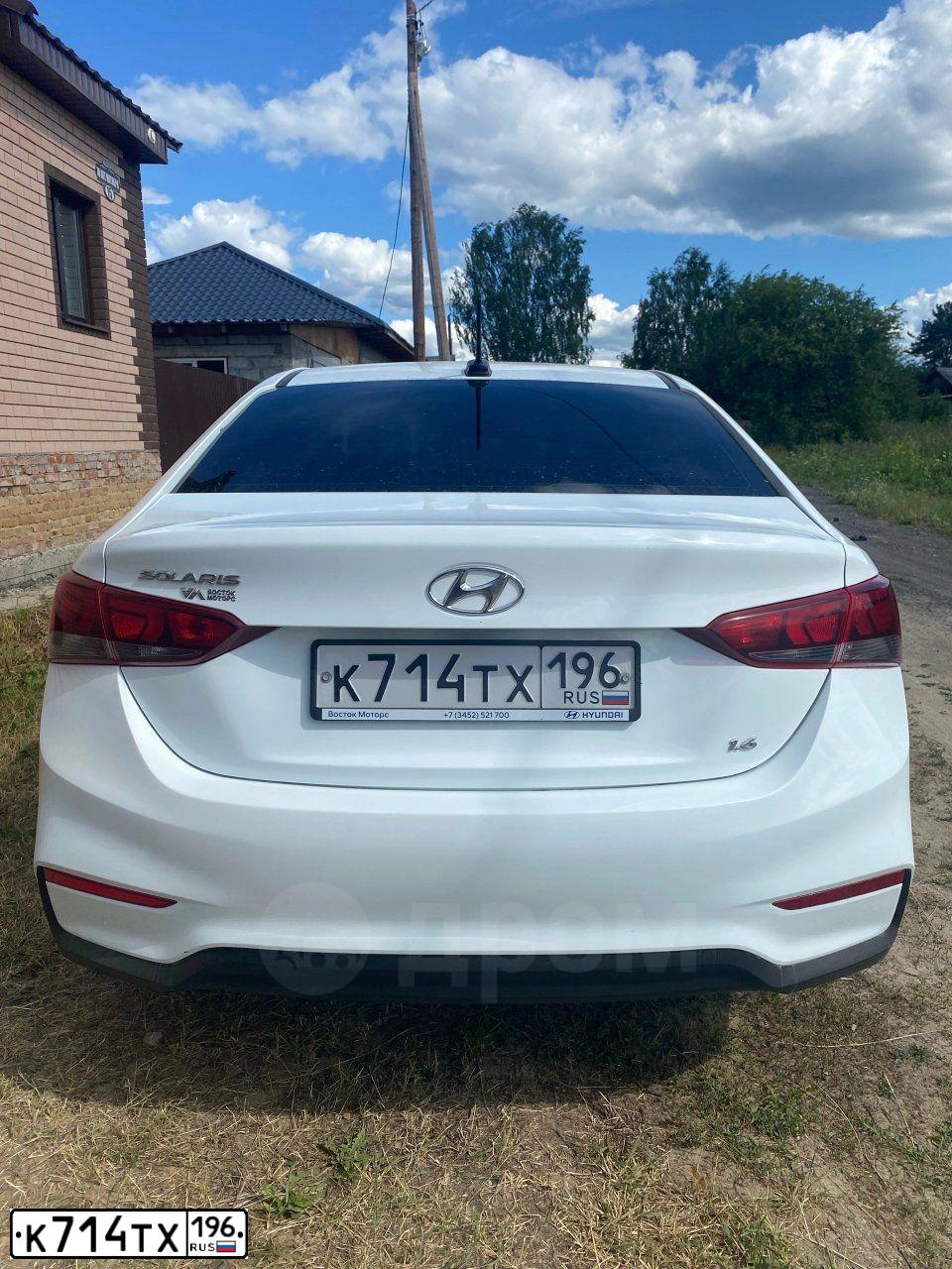 Фото автомобиля HYUNDAI SOLARIS, 2019 — госномер Т293НО196. Цвет: Белый