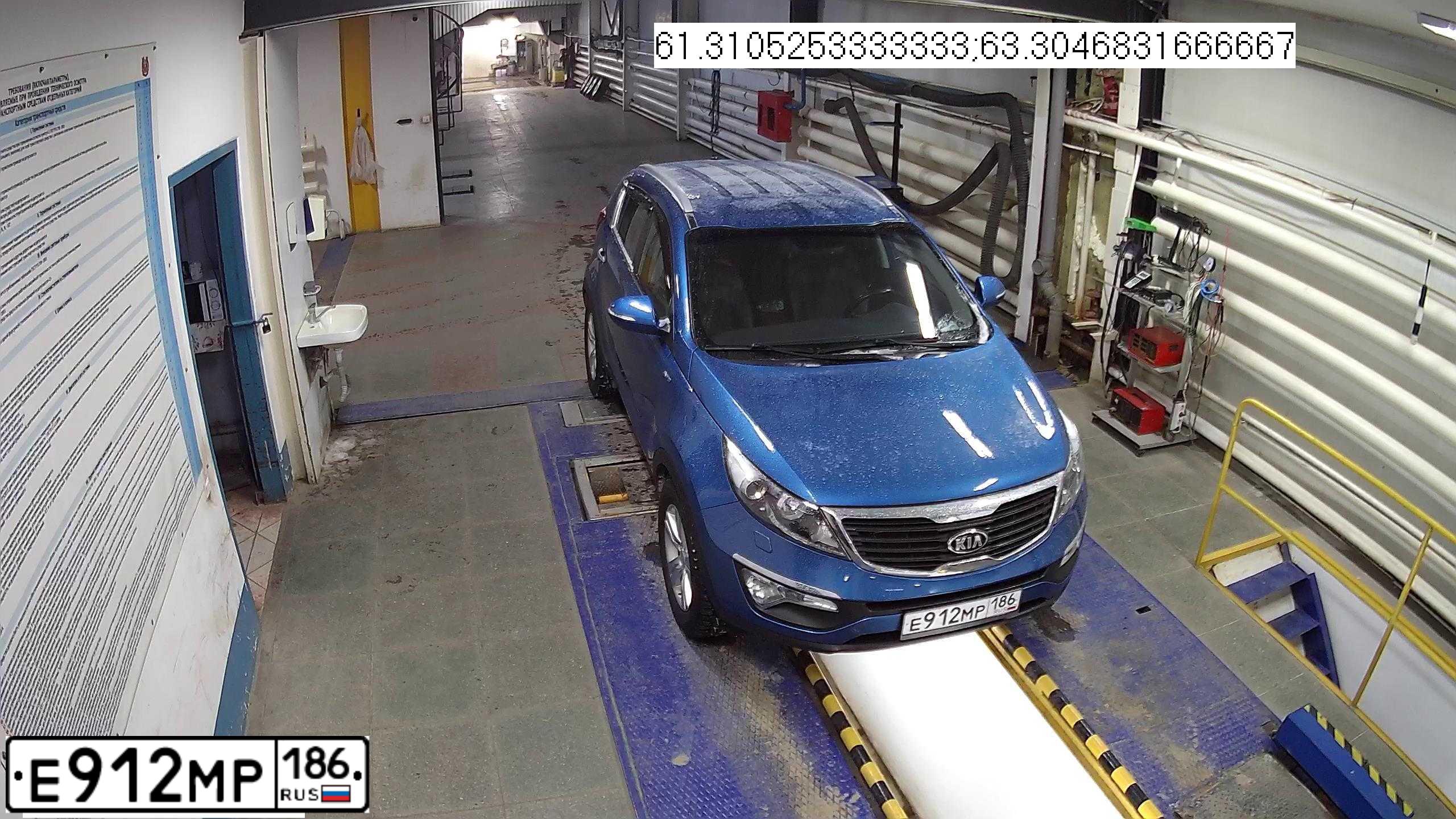 Фото автомобиля KIA SPORTAGE, 2012 — госномер Е912МР186. Цвет: синий