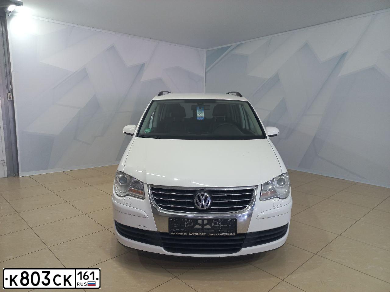 Фото автомобиля MITSUBISHI OUTLANDER, 2012 — госномер Т080ВА61. Цвет: Белый