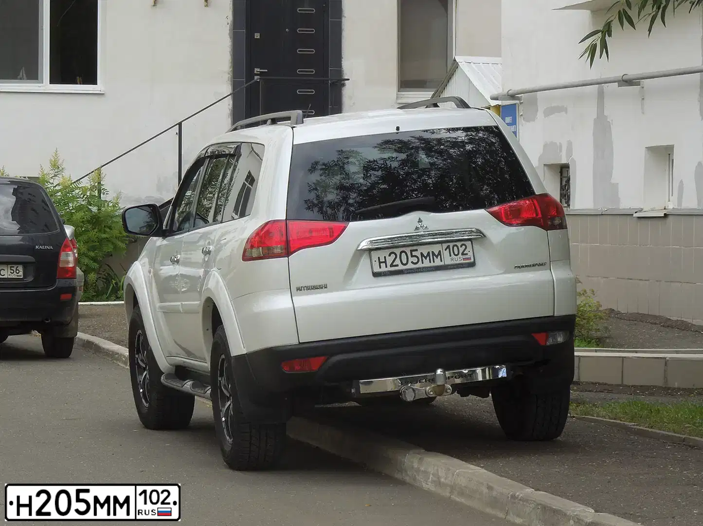 Фото автомобиля MITSUBISHI PAJERO SPORT, 2014 — госномер Н205ММ102. Цвет: Белый