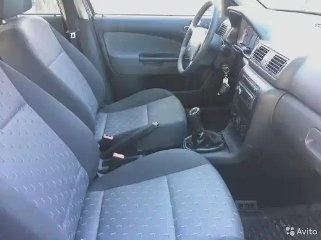 Фото автомобиля SKODA OCTAVIA, 2009 — госномер В495СУ197. Цвет: ВИШНЕВЫЙ