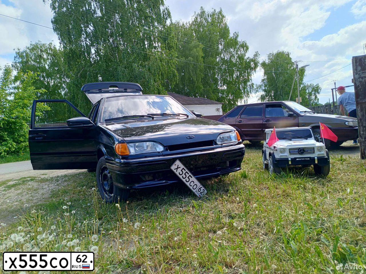 Фото автомобиля LADA 2171 PRIORA, 2011 — госномер Х555СО62. Цвет: Сине-Черный