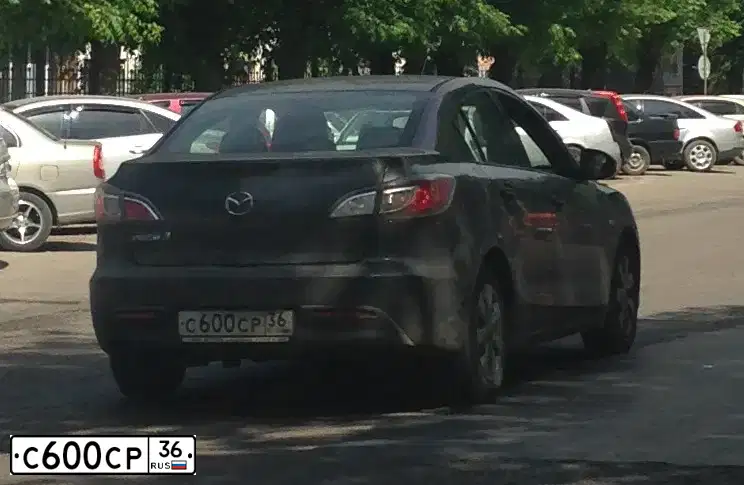 Фото автомобиля MAZDA 3, 2010 — госномер Т904КЕ31. Цвет: ТЕМНО-СЕРЫЙ