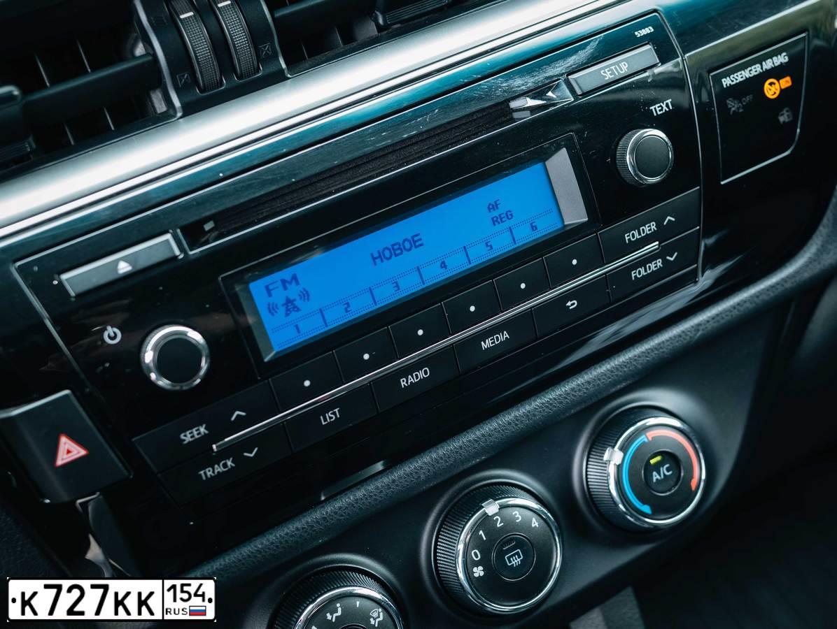 Фото автомобиля TOYOTA COROLLA, 2014 — госномер Т090АН154. Цвет: БРОНЗОВЫЙ МЕТАЛЛИК
