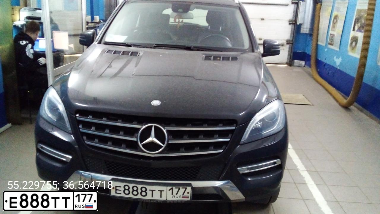 Фото автомобиля VOLKSWAGEN TOUAREG, 2005 — госномер А549ВС977. Цвет: ЧЕРНЫЙ