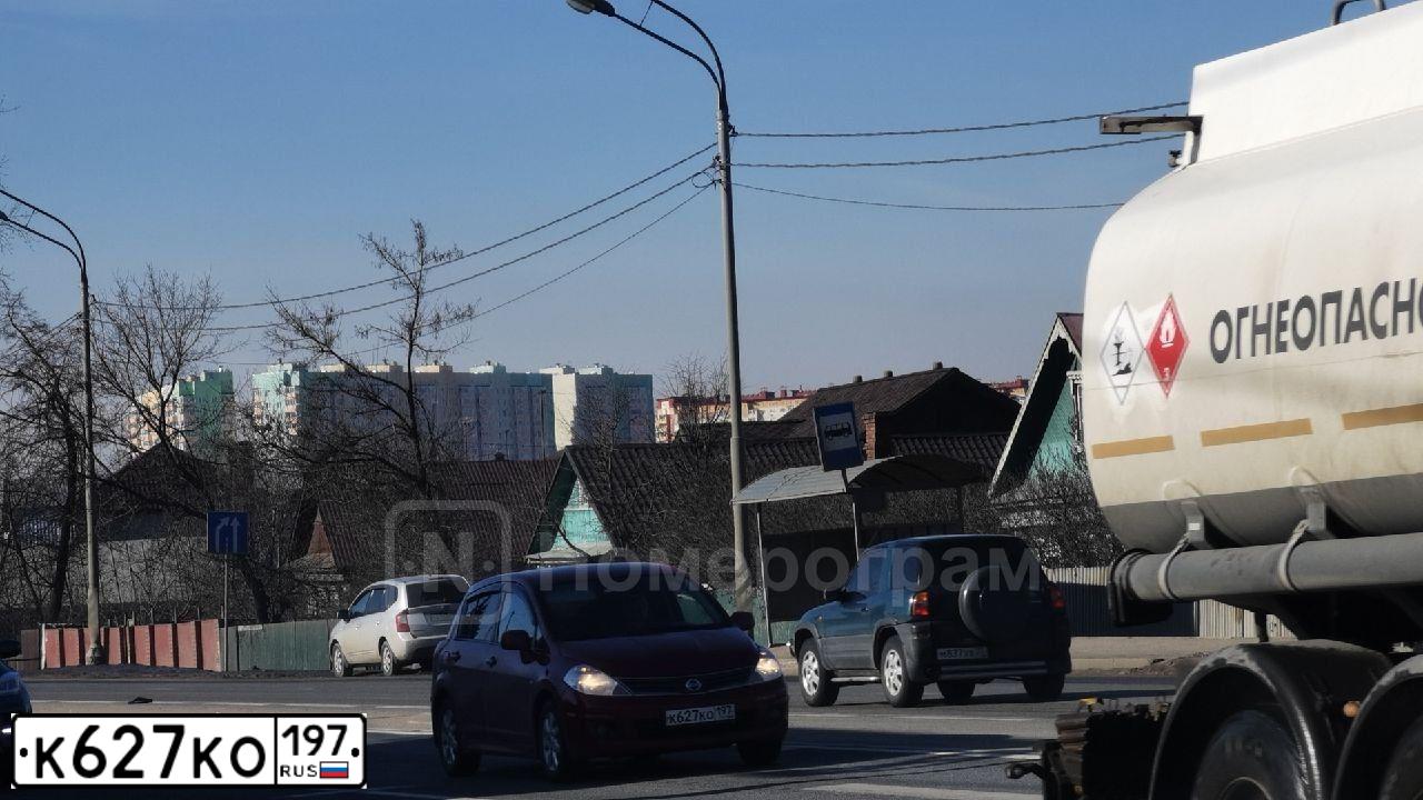 Фото автомобиля NISSAN TIIDA, 2010 — госномер К627КО197. Цвет: КРАСНЫЙ