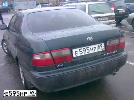 Фото автомобиля TOYOTA CARINA, 1994 — госномер Р438СО161. Цвет: ТЕМНО-СИНИЙ