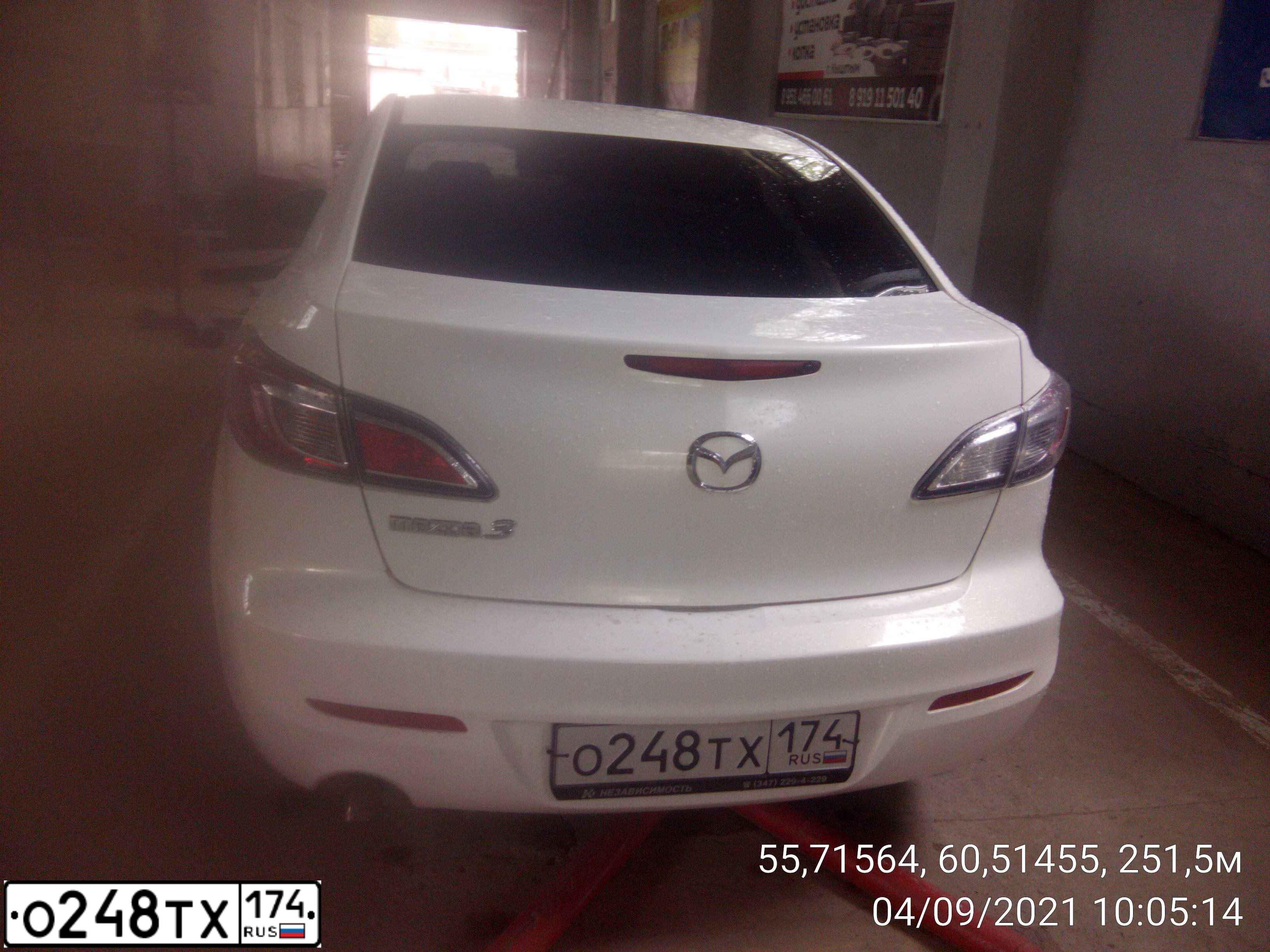 Фото автомобиля MAZDA A 3, 2012 — госномер О248ТХ174. Цвет: Белый