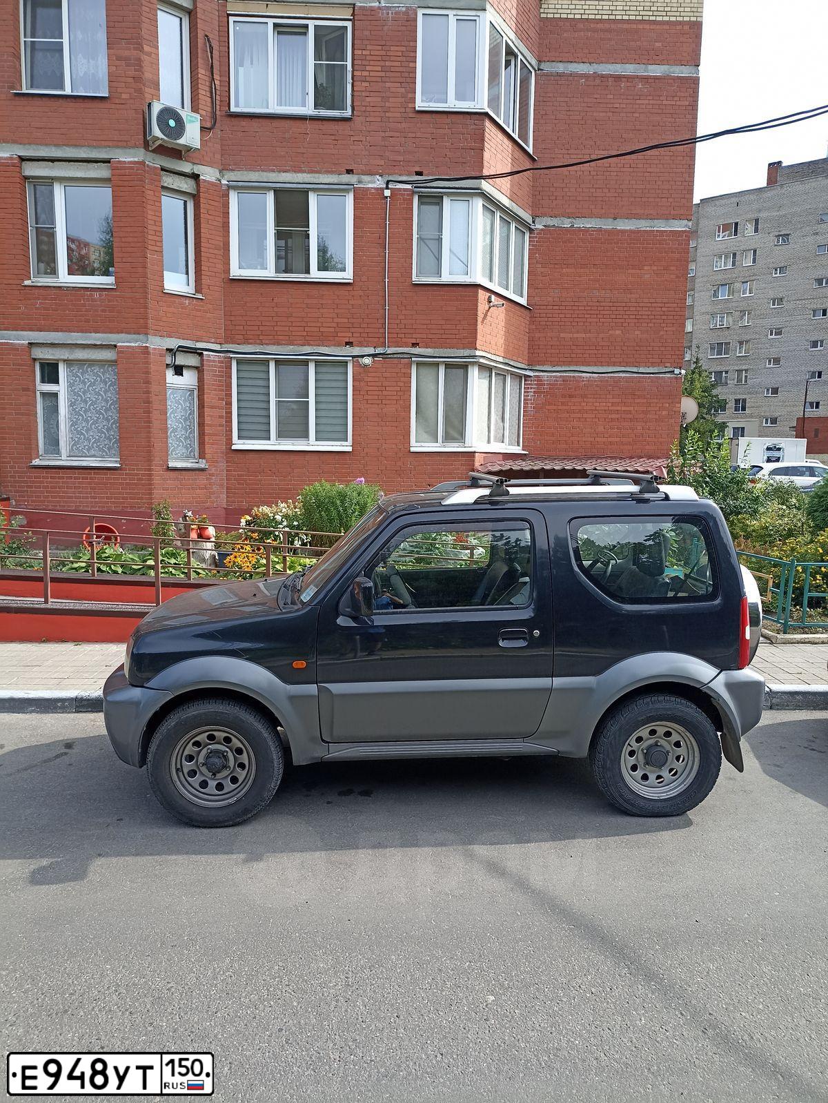Фото автомобиля SUZUKI JIMNY, 2008 — госномер Е948УТ150. Цвет: ЧЕРНЫЙ