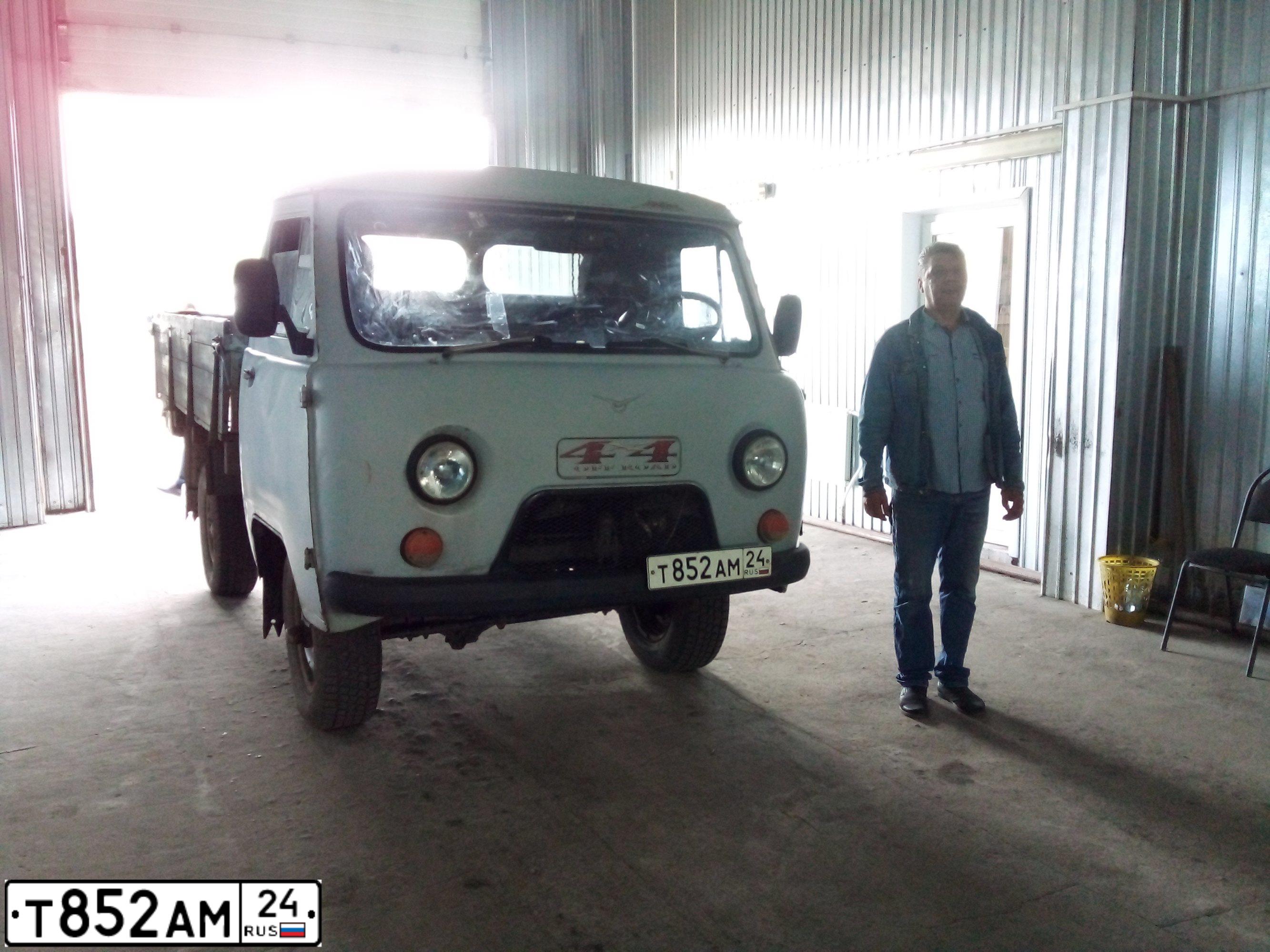 Фото автомобиля LADA 1117 KALINA, 2009 — госномер Т852АМ124. Цвет: КРАСНЫЙ