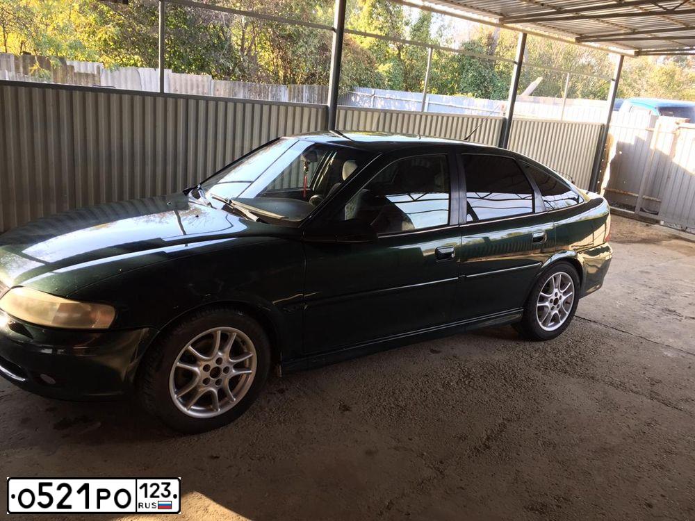 Фото автомобиля OPEL VECTRA, 1999 — госномер Н500ТЕ23. Цвет: Темно-зеленый