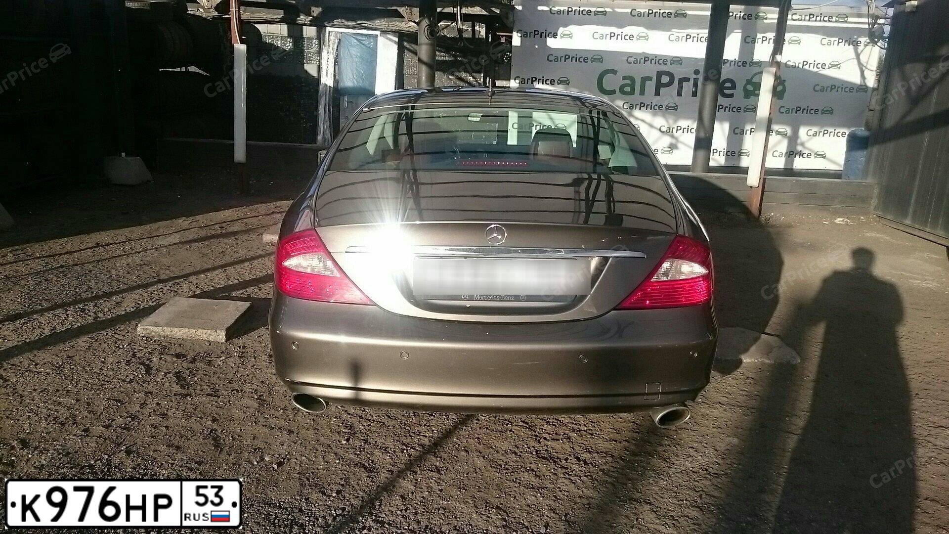 Фото автомобиля MERCEDES CLS-KLASSE, 2007 — госномер К976НР53. Цвет: серо - коричневый