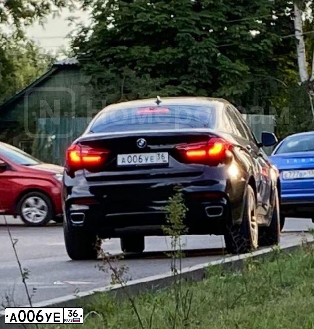 Фото автомобиля BMW X6, 2016 — госномер О213НР136. Цвет: ЧЕРНЫЙ