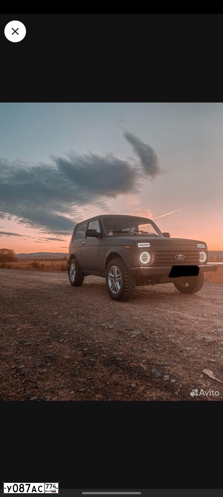 Фото автомобиля LADA 2121 NIVA, 2011 — госномер У087АС774. Цвет: ТЕМНО-ВИШНЕВЫЙ