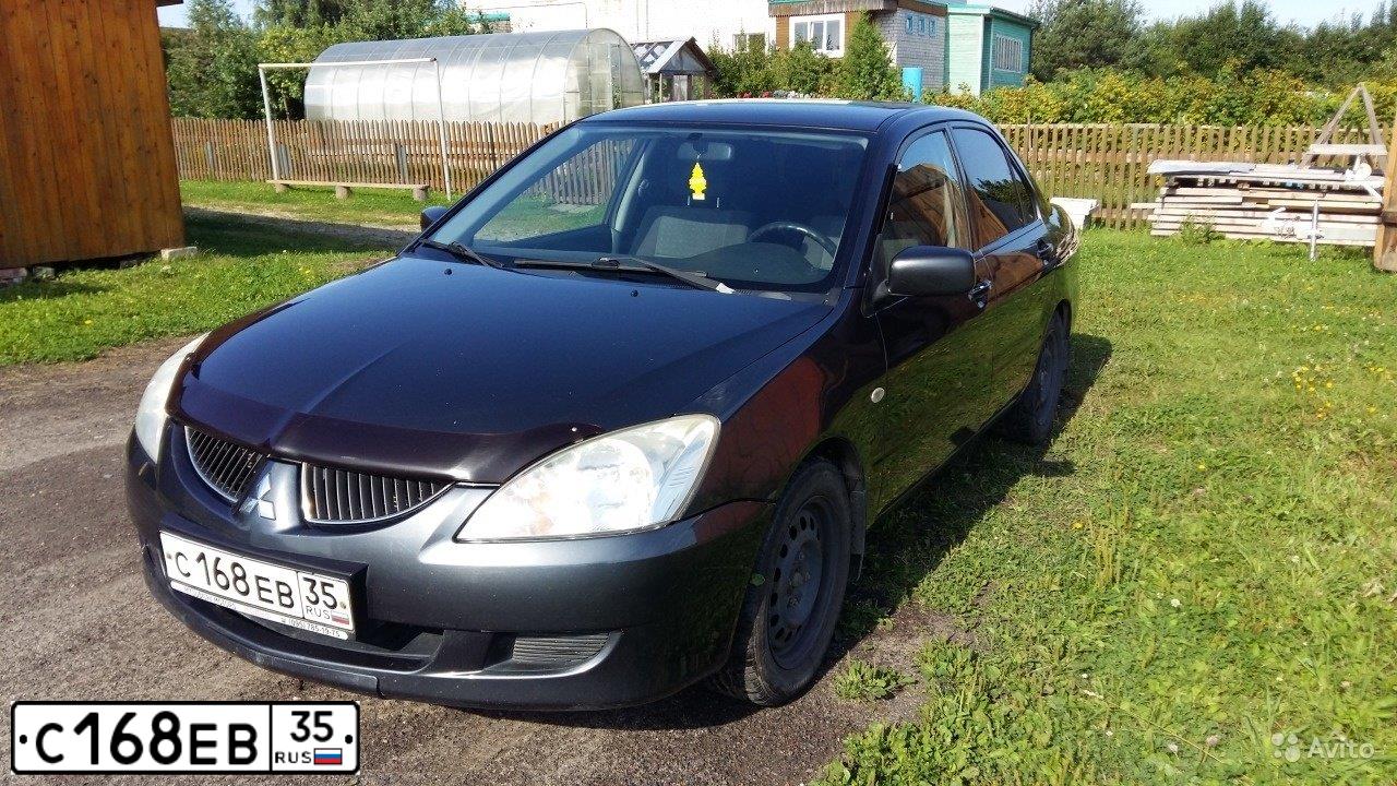 Фото автомобиля MITSUBISHI LANCER, 2004 — госномер С168ЕВ35. Цвет: СЕРЫЙ