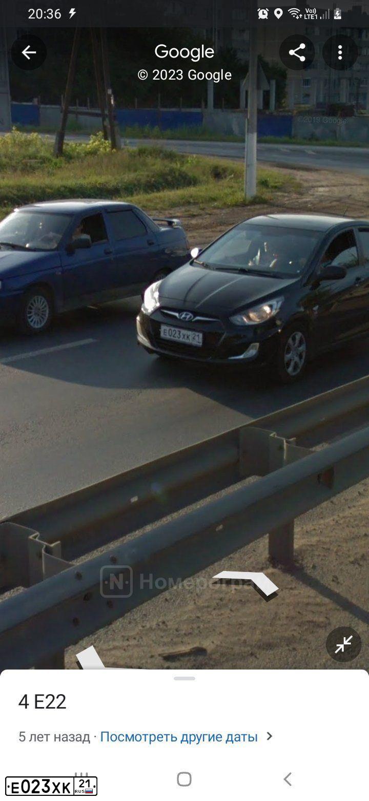 Фото автомобиля HYUNDAI SOLARIS, 2011 — госномер Е023ХК21. Цвет: ЧЕРНЫЙ