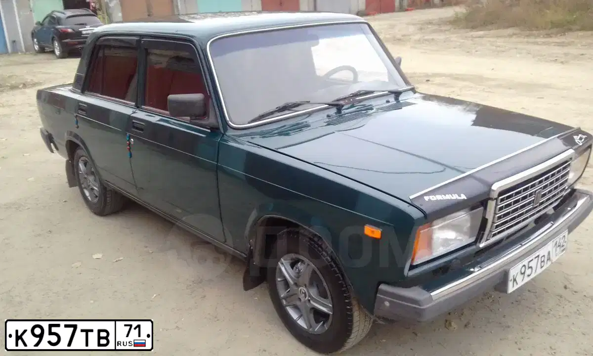 Фото автомобиля LADA 2110, 2007 — госномер К957ТВ71. Цвет: СЕРЕБРИСТО-ТЕМНО-СИНИЙ