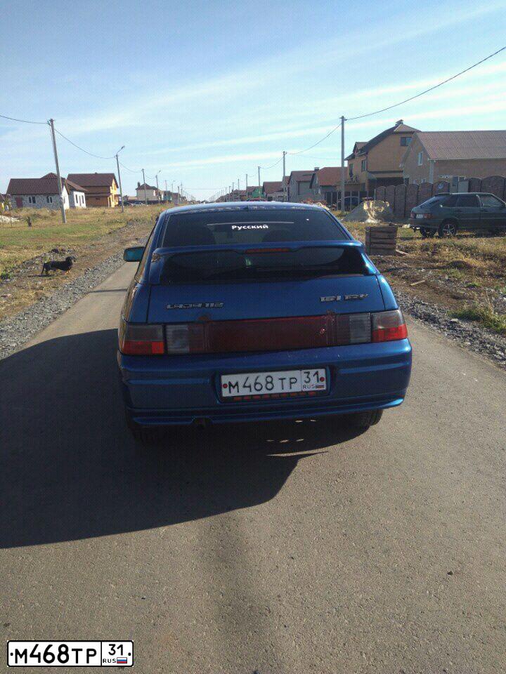 Фото автомобиля LADA 2112, 2007 — госномер Т997АВ31. Цвет: синий