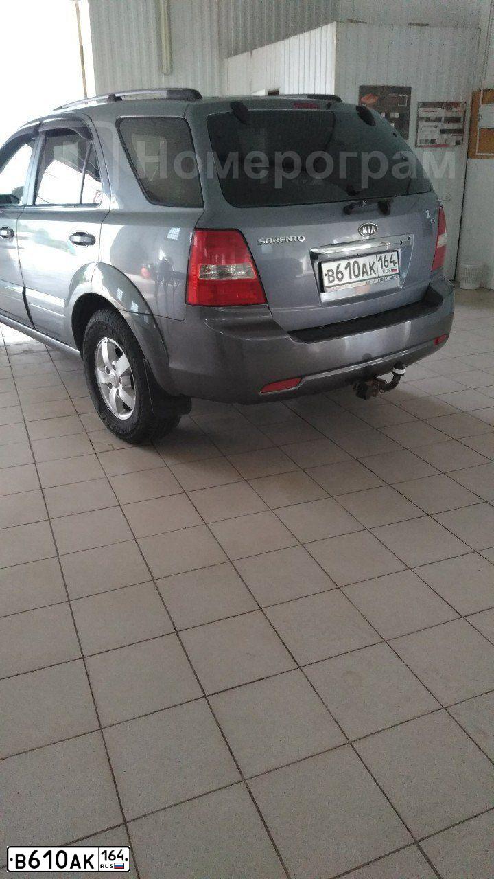 Фото автомобиля KIA SORENTO, 2008 — госномер Т135ТК190. Цвет: ТЕМНО-СЕРЫЙ