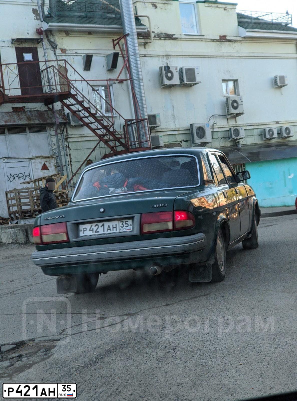Фото автомобиля GAZ 3110 WOLGA, 1998 — госномер Р421АН35. Цвет: ЗЕЛЕНЫЙ