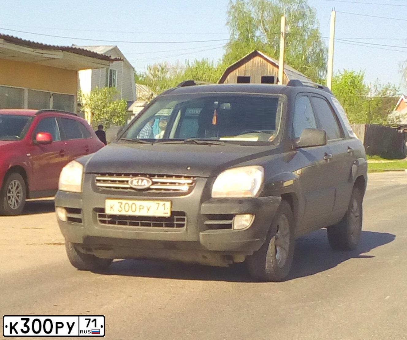 Фото автомобиля KIA SPORTAGE, 2007 — госномер О425СК32. Цвет: ЧЕРНЫЙ