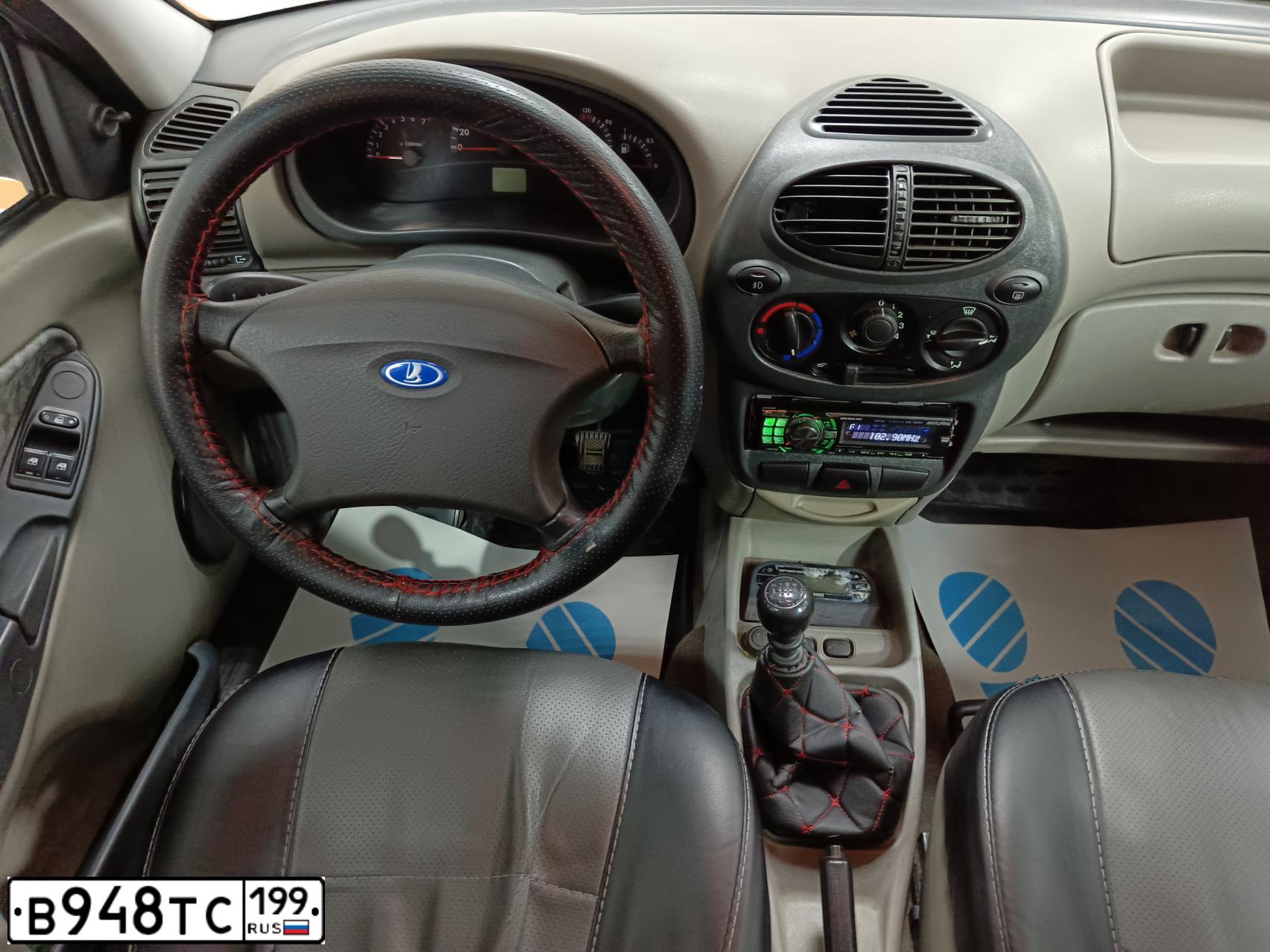 Фото автомобиля LADA 1117 KALINA, 2009 — госномер В948ТС33. Цвет: БЕЛО-ЖЕЛТЫЙ ПЕРЛАМУТРОВЫЙ
