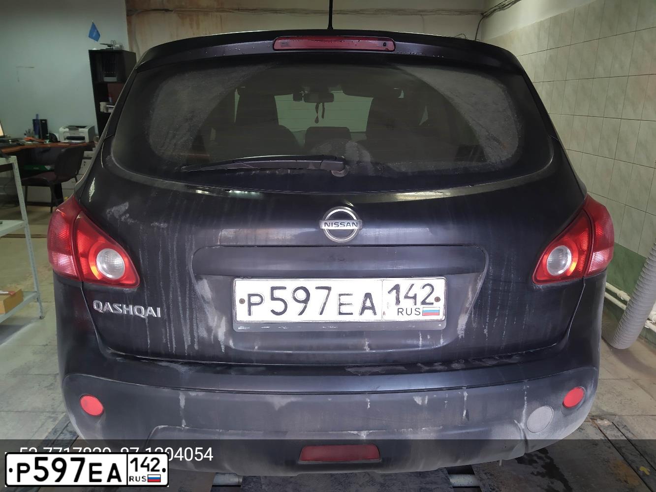 Фото автомобиля NISSAN QASHQAI, 2009 — госномер Р597ЕА142. Цвет: ЧЕРНЫЙ