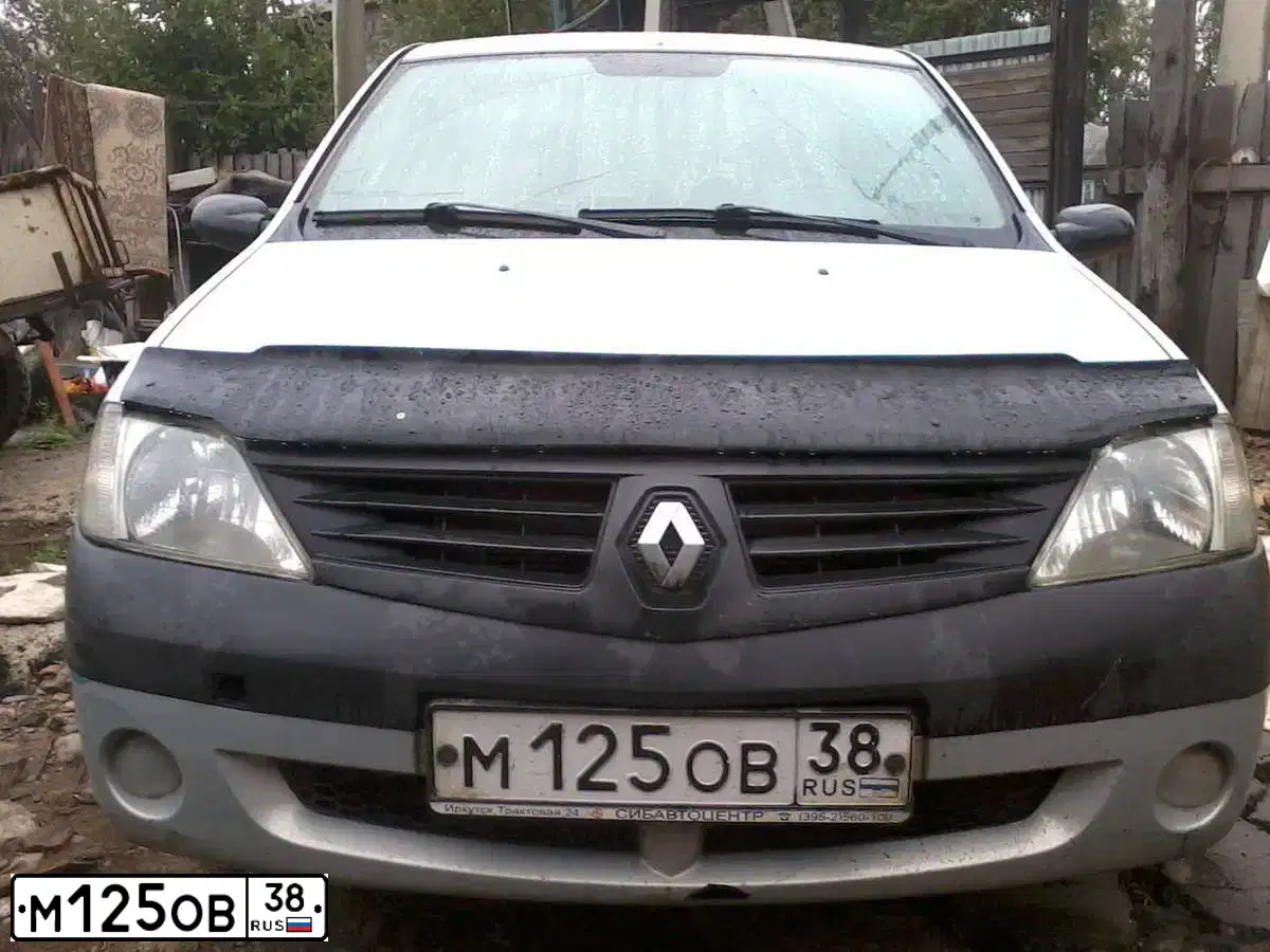 Фото автомобиля RENAULT LOGAN, 2005 — госномер М125ОВ38. Цвет: Серый