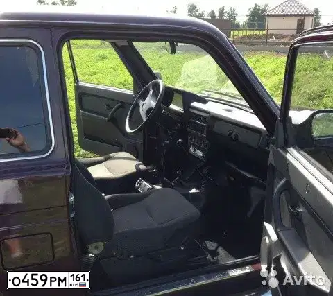 Фото автомобиля LADA NIVA, 2012 — госномер Т453ОН05. Цвет: ВИШНЕВЫЙ ТЕМНЫЙ