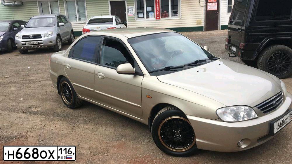 Фото автомобиля KIA SPECTRA, 2007 — госномер А399ТТ702. Цвет: Золотисто-бежевый