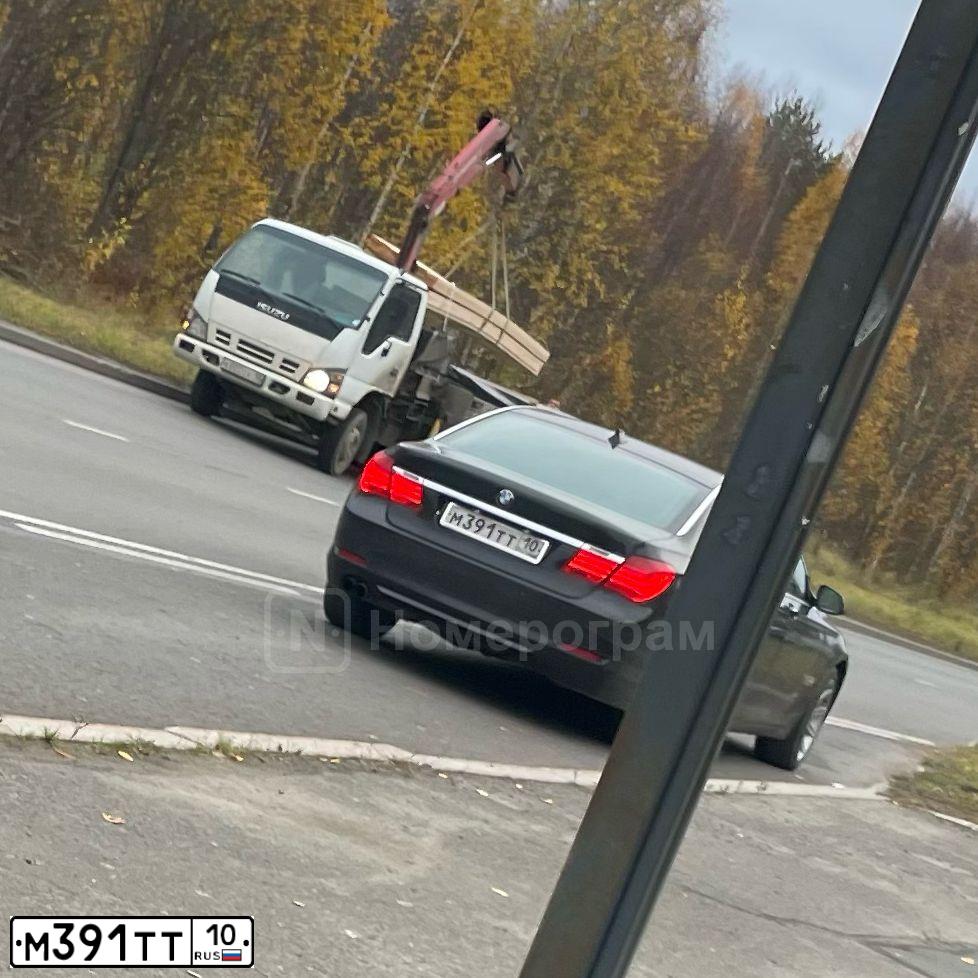Фото автомобиля BMW SERIE 7, 2009 — госномер О498СА98. Цвет: ЧЕРНЫЙ
