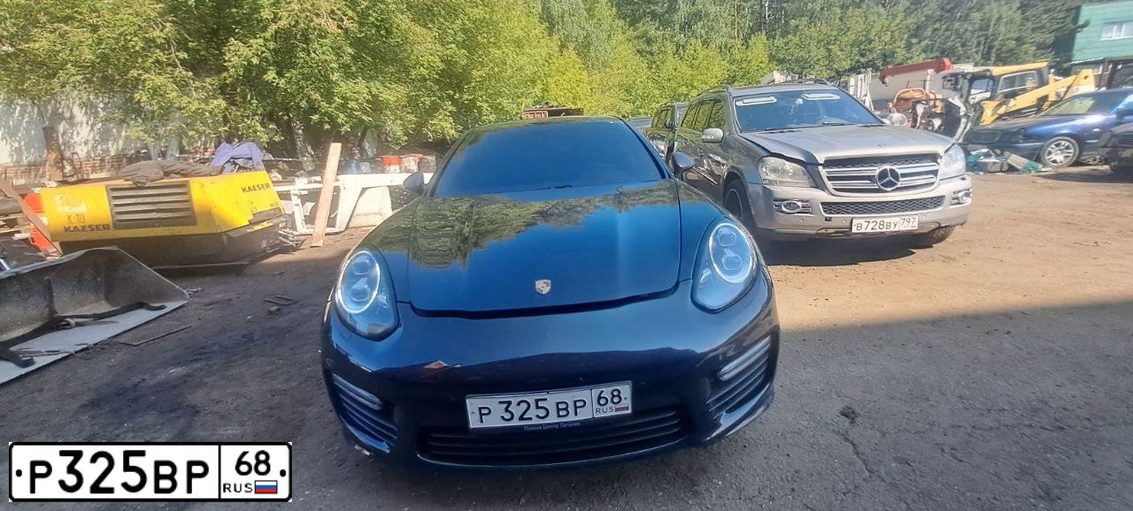 Фото автомобиля PORSCHE PANAMERA, 2011 — госномер Р325ВР68. Цвет: ЧЕРНЫЙ